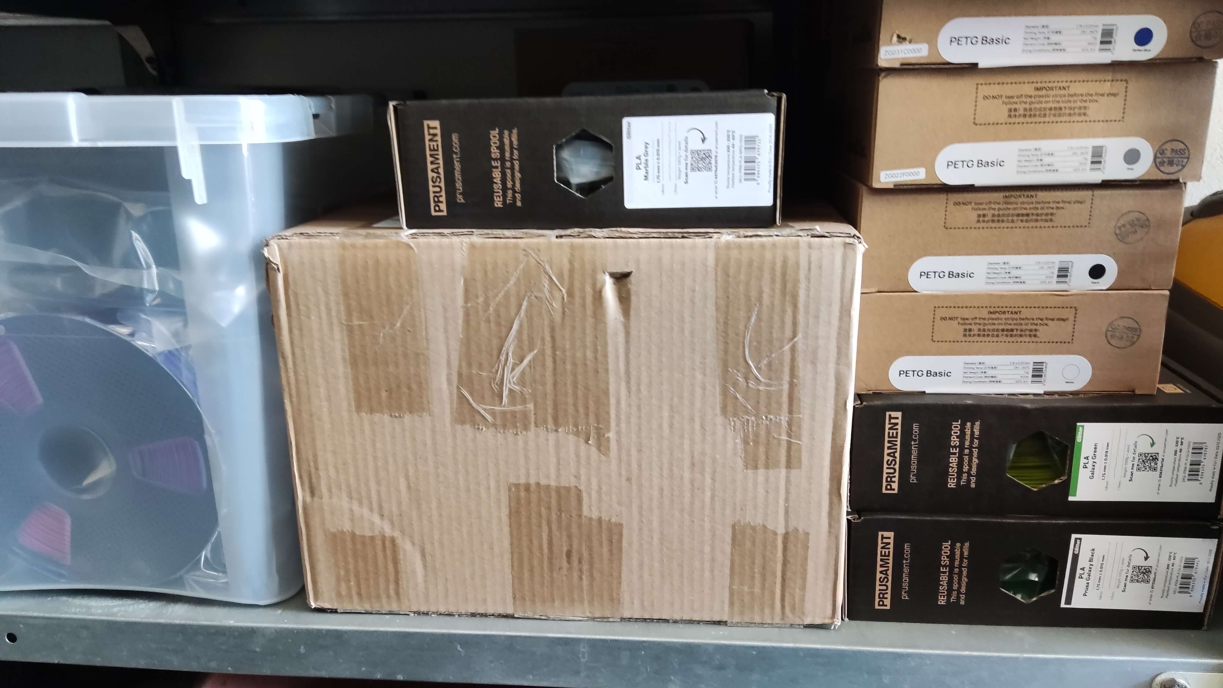 A humble workspace: 1 printer, but 60+ kg filament - image 6